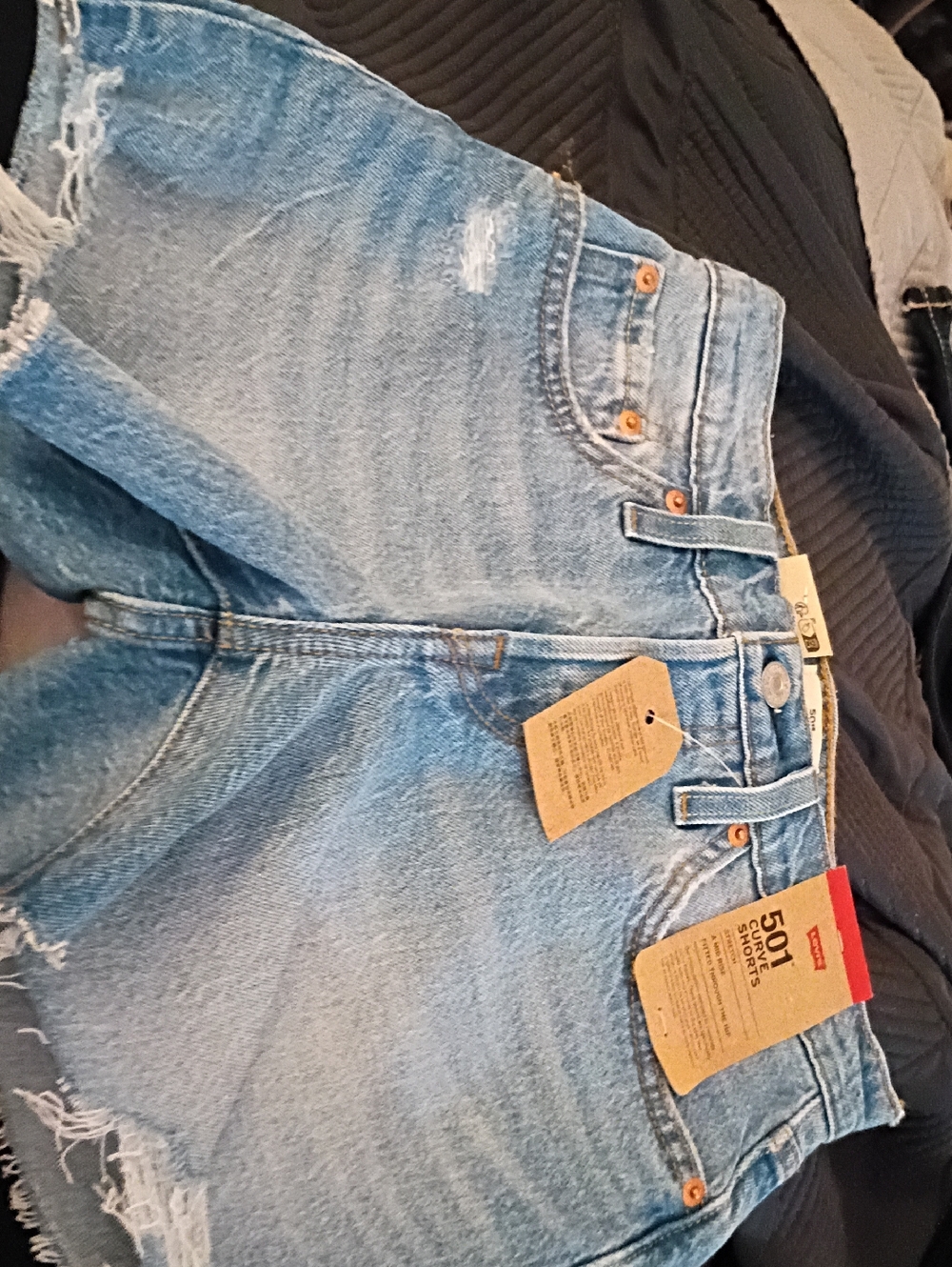 Levi's light blue distressed denim shorts